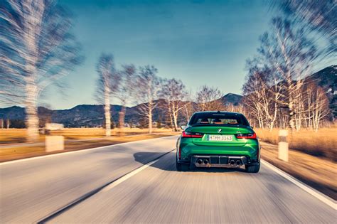Performance Redefined: Porsche 911 vs. BMW M3 Review